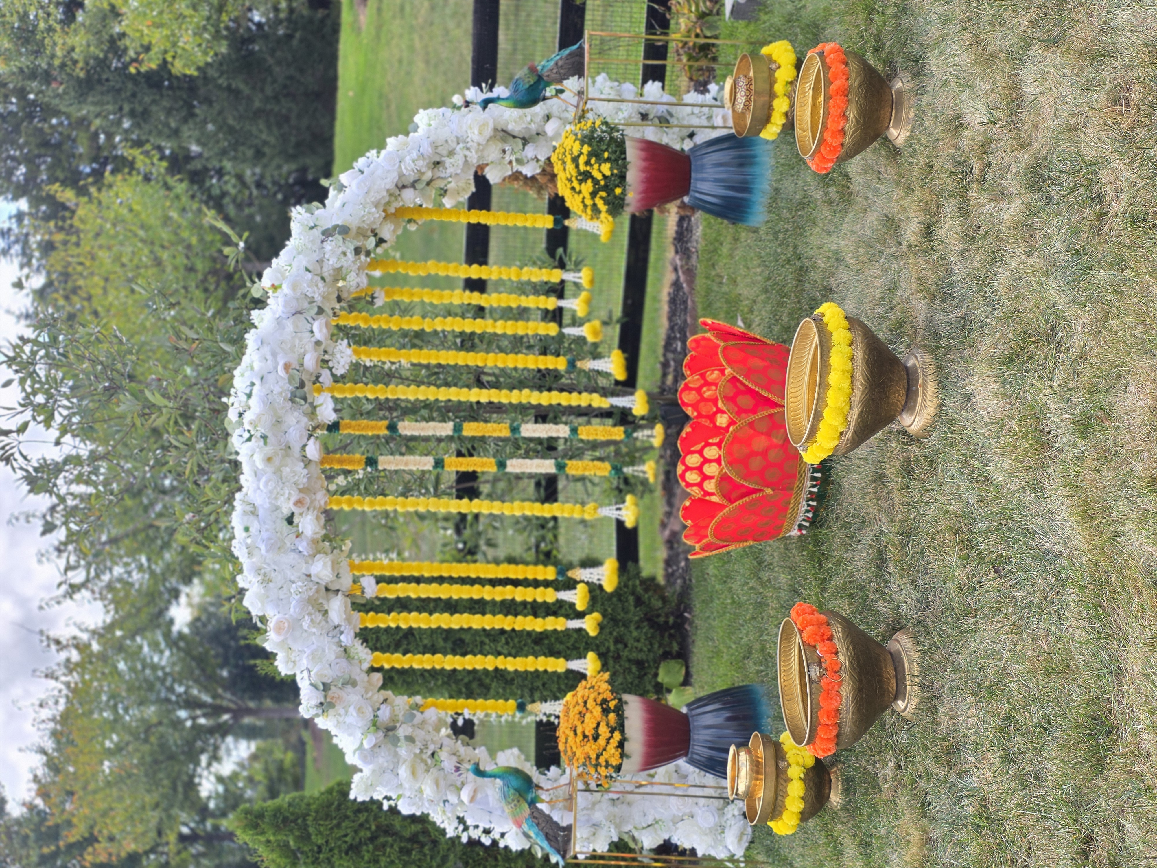 Haldi arch decor with yellow floral hanging elements